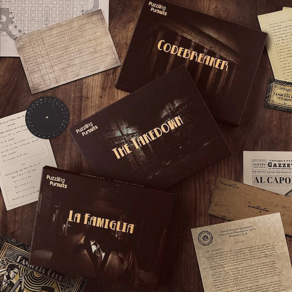 The three Famiglia Trilogy boxes together: La Famiglia, The Takedown and Codebreaker