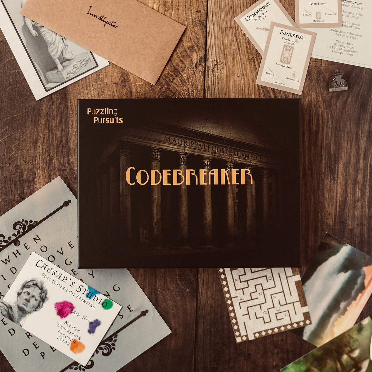 Codebreaker game box with materials on a wooden table